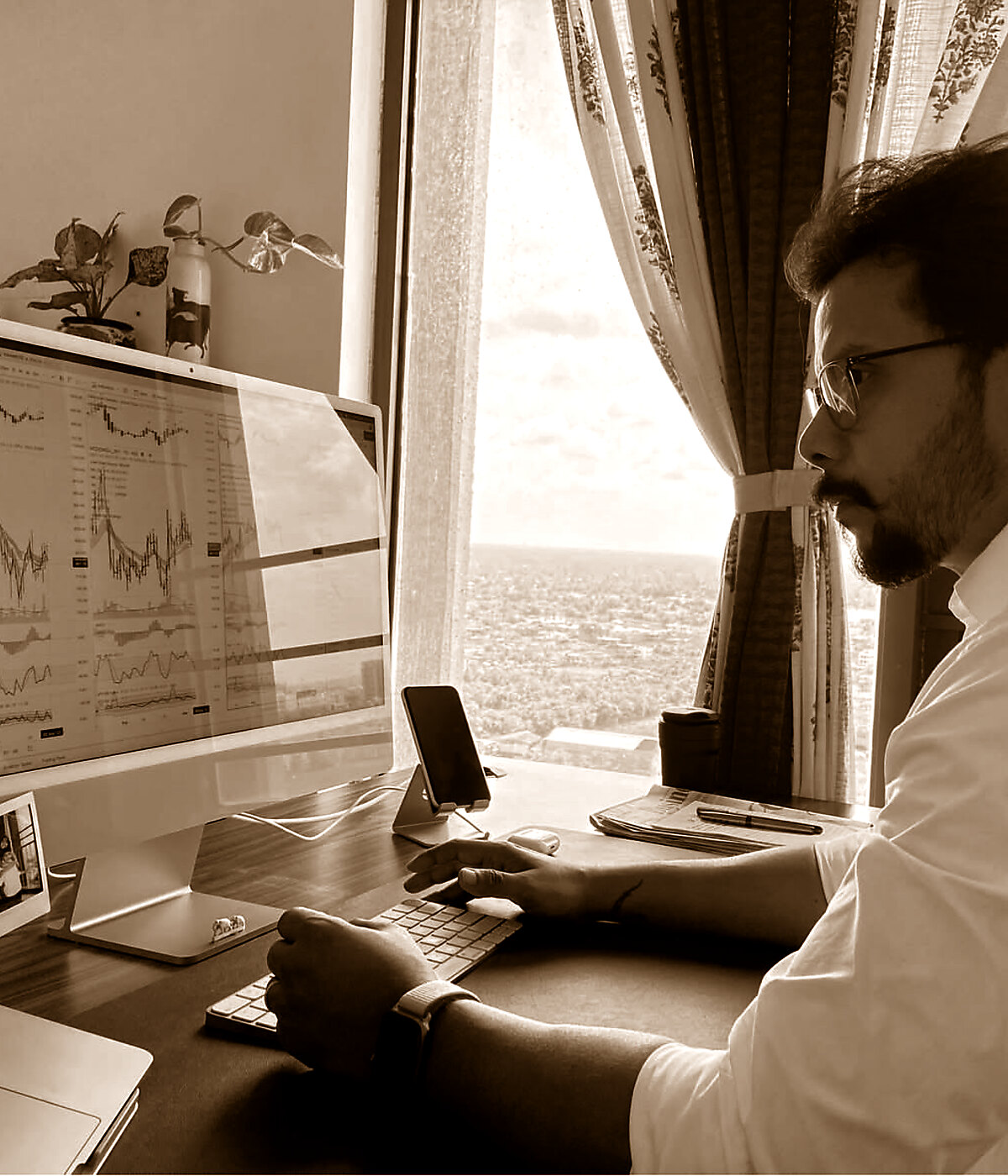 Abhijit Paul, founder of Alphative, at his charting desk